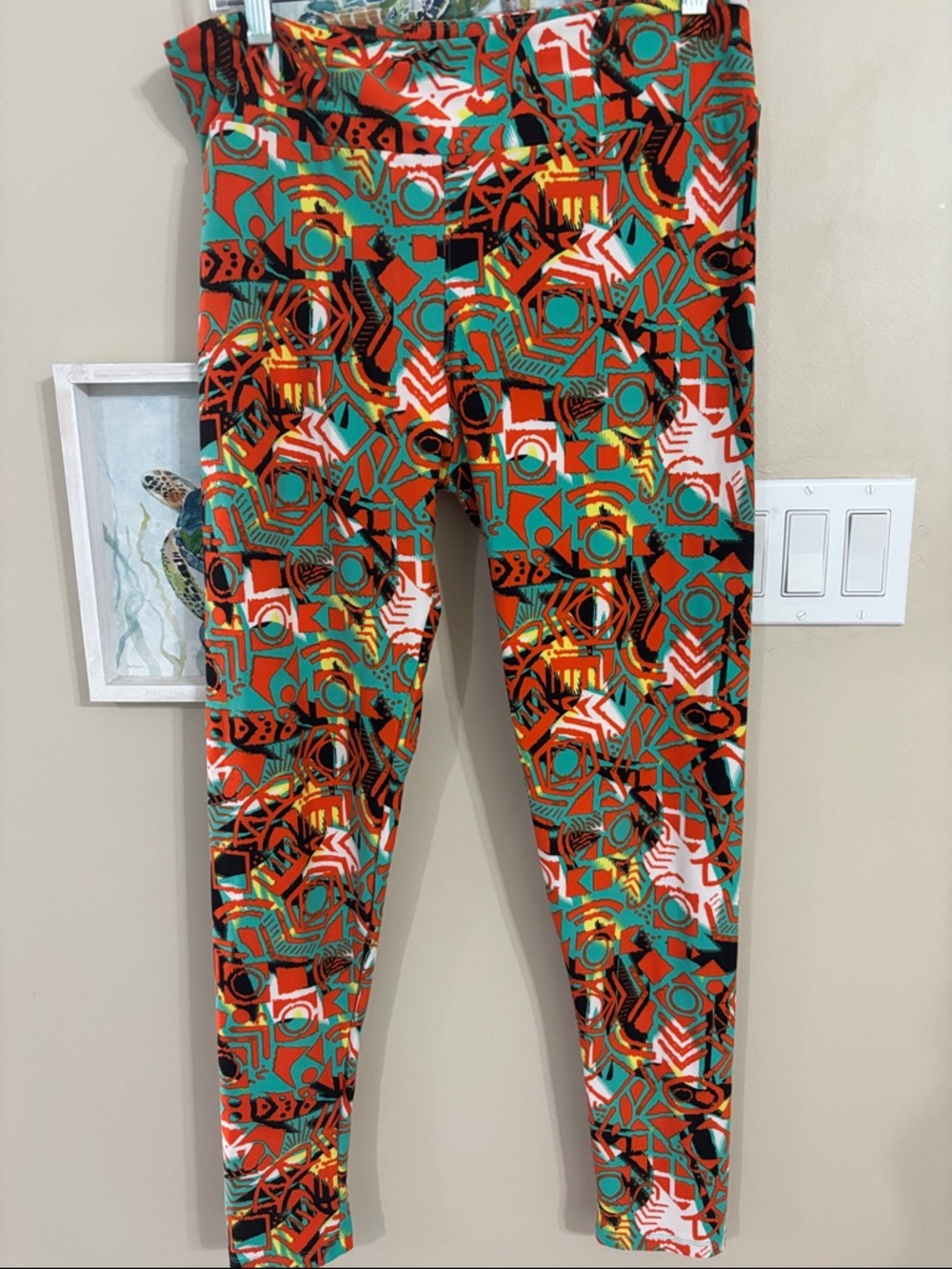 LuLaRoe  Leggings in Teal, Orange & Black Geometric Print euc